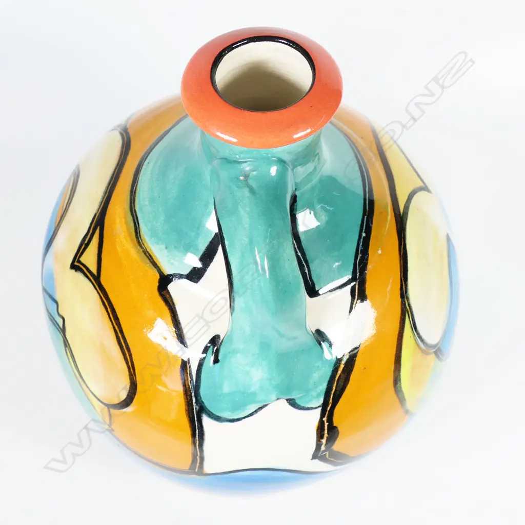 Andrew van der Putten flagon - aqua green and blue glazes with fish motif. Impressed potters mark. H.250mm. Frit to rim and small glaze losses. Image 1++