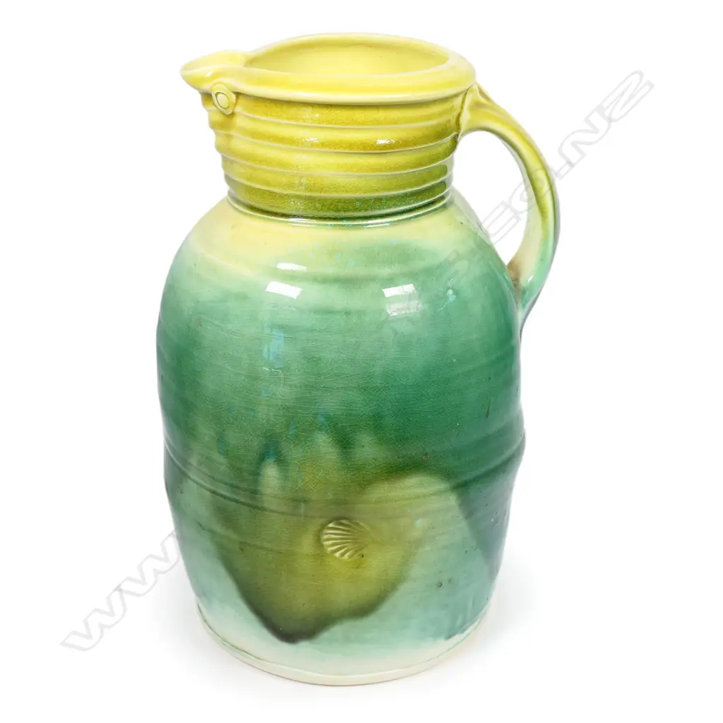 Andrew van der Putten large pitcher - milk can shape with coiled band around neck, bird eye detail and thick yellow and green glaze. Potter's mark to base. H.300mm Image 1++