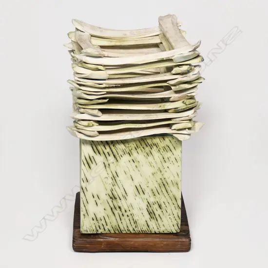 Square vase with lattice top on a cedarwood stand. Matte finish with incised rain-like design to sides. Potter unknown, triangle mark to base. H.260mm x 140sq