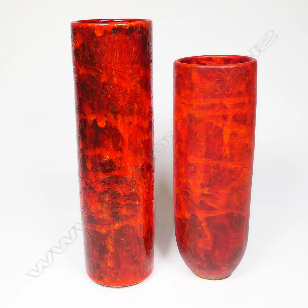 Two Keum Sun Lee/Sang Sool Shim red cylinder vases - one with high gloss finish and one matte finish with flower impressions. H.280/240mm Image 1++