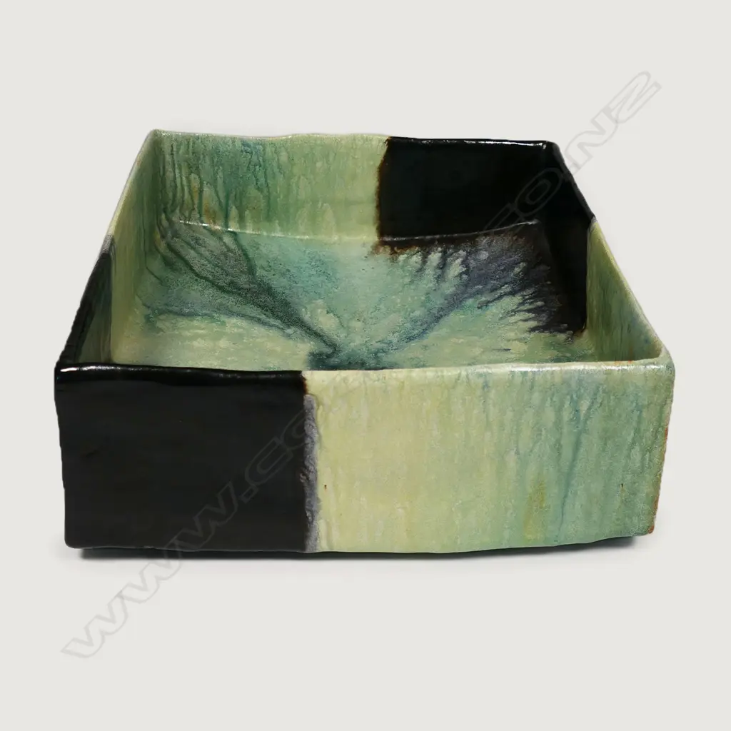 Jeff Mincham (Australia) slab sided bowl. The colour of the glazes are intended to reflect the 'patterns and colours of the Australian landscape'. Signed and dated '05 to base. H.120 x 290 x 290mm Image 1++