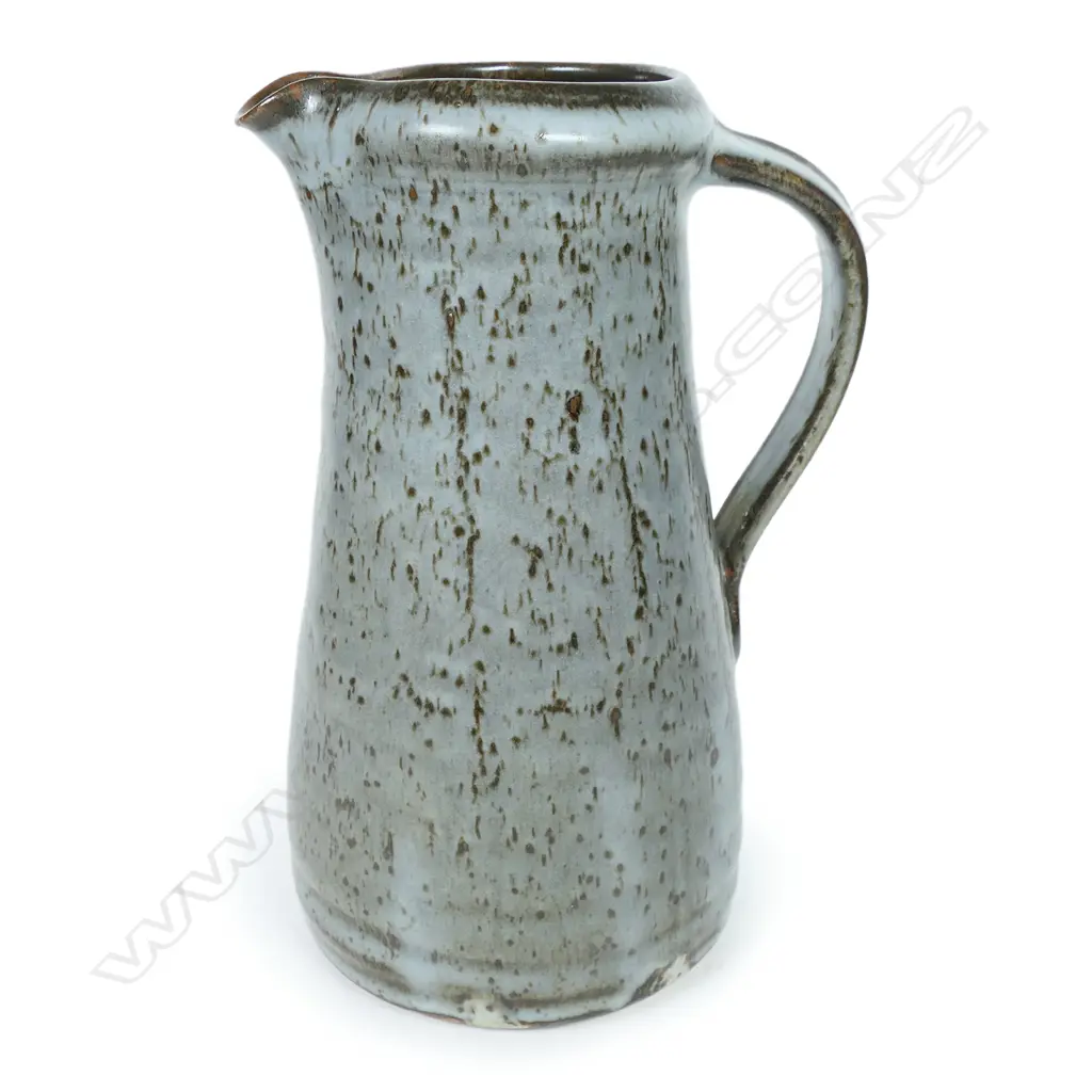 Len Castle jug of tapered cylinder form with variable dark grey glaze. Impressed mark. H.245mm Image 1++