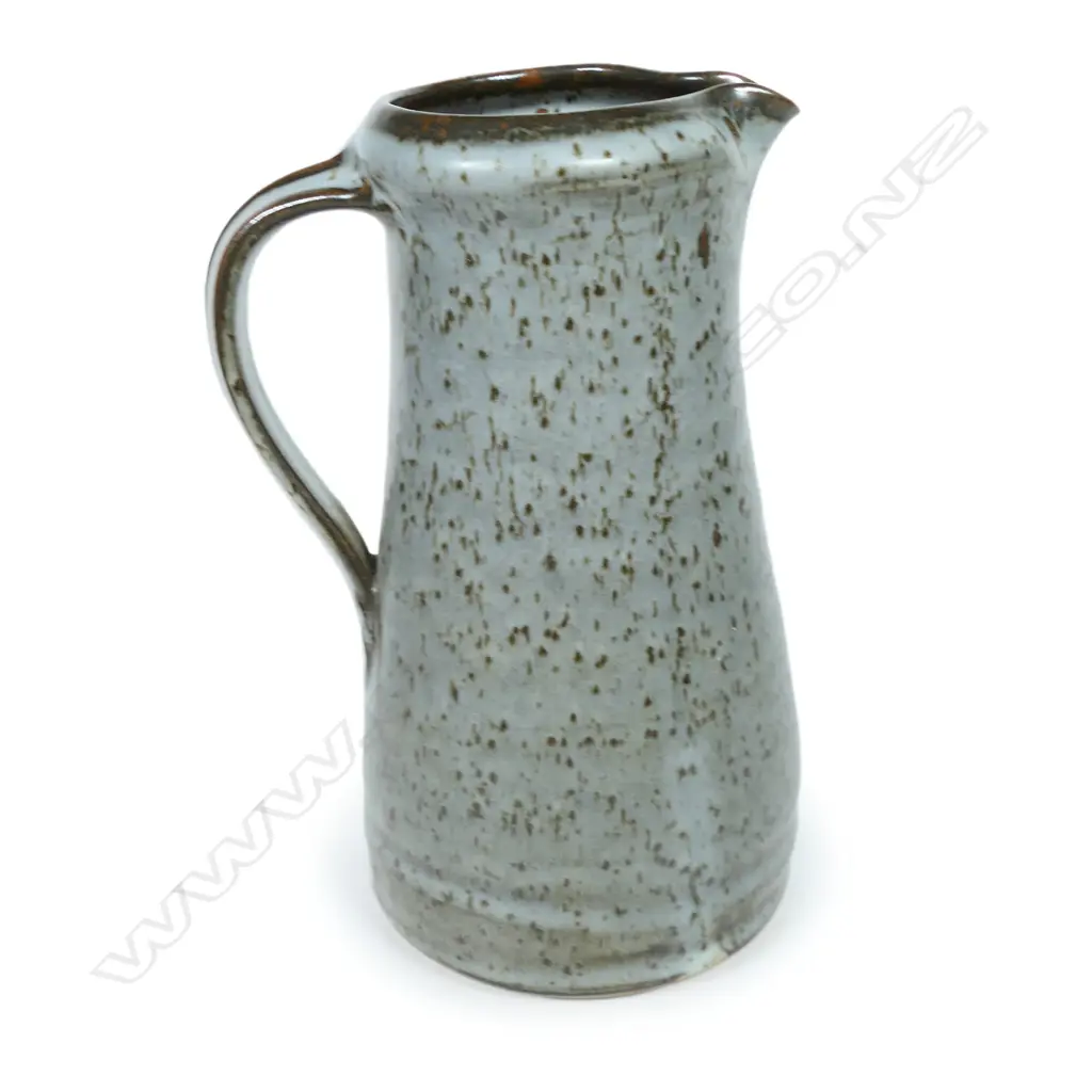 Len Castle jug of tapered cylinder form with variable dark grey glaze. Impressed mark. H.245mm Image 1++