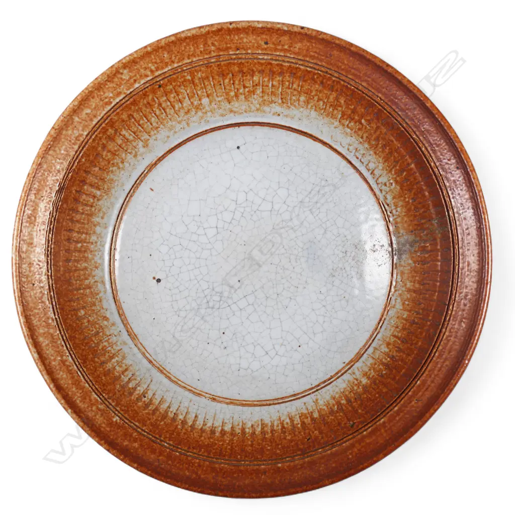 Len Castle shino glazed shallow bowl with repeating pattern below the rim, Image 1++
