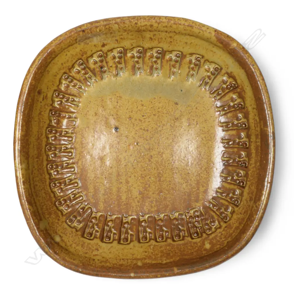 Don Thornley dish decorated with impressed stamp designs, wood ash glaze in green and brown tones. Makers mark stamped to base. 295 x 290 x 70mm. Image 1++