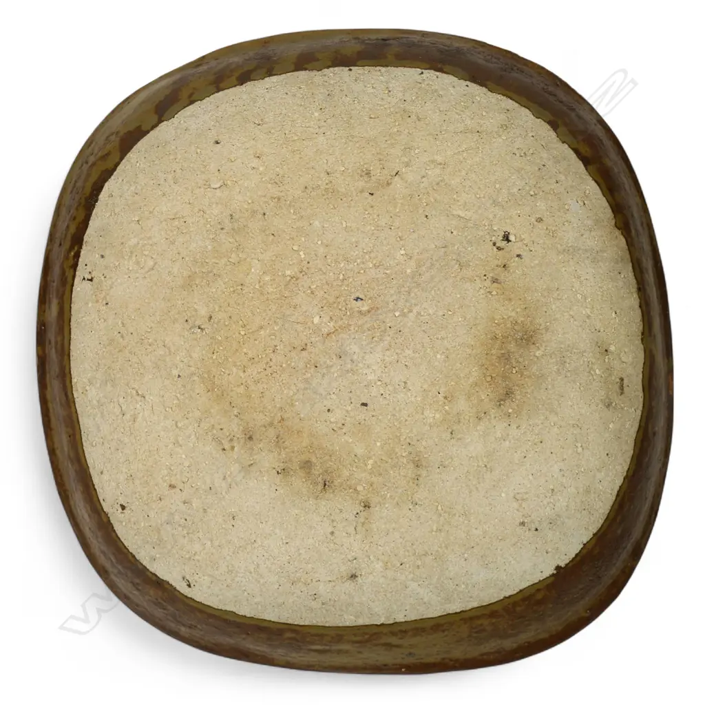 Don Thornley dish decorated with impressed stamp designs, wood ash glaze in green and brown tones. Makers mark stamped to base. 295 x 290 x 70mm. Image 1++