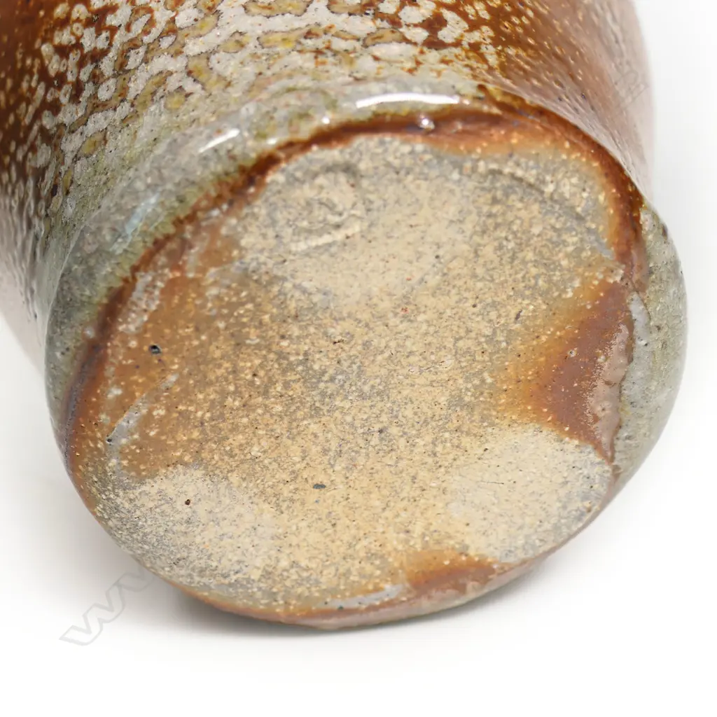 Duncan Shearer wood fired jug with variable gold and brown glaze effects. H.185mm Image 1++