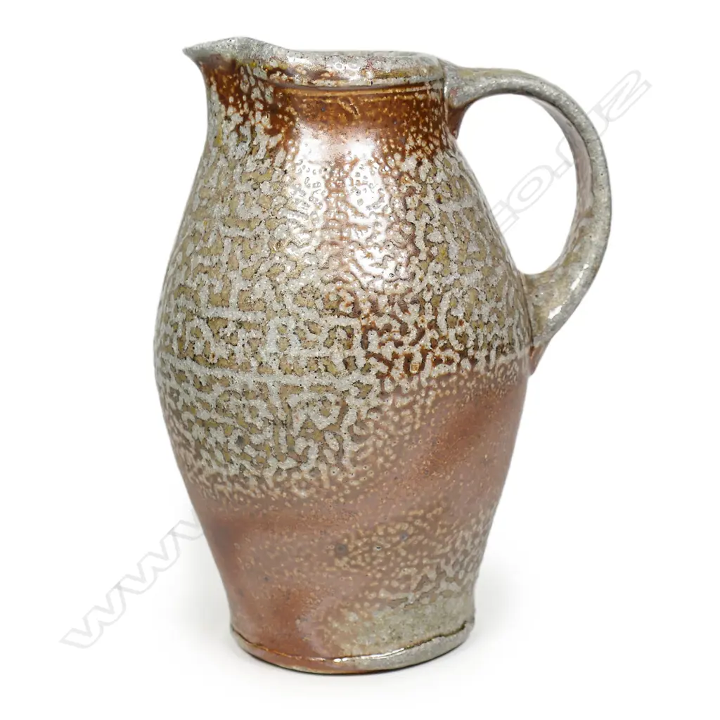 Duncan Shearer wood fired jug with variable gold and brown glaze effects. H.185mm Image 1++
