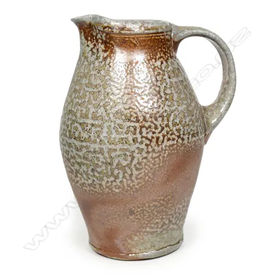 Duncan Shearer wood fired jug with variable gold and brown glaze effects. H.185mm