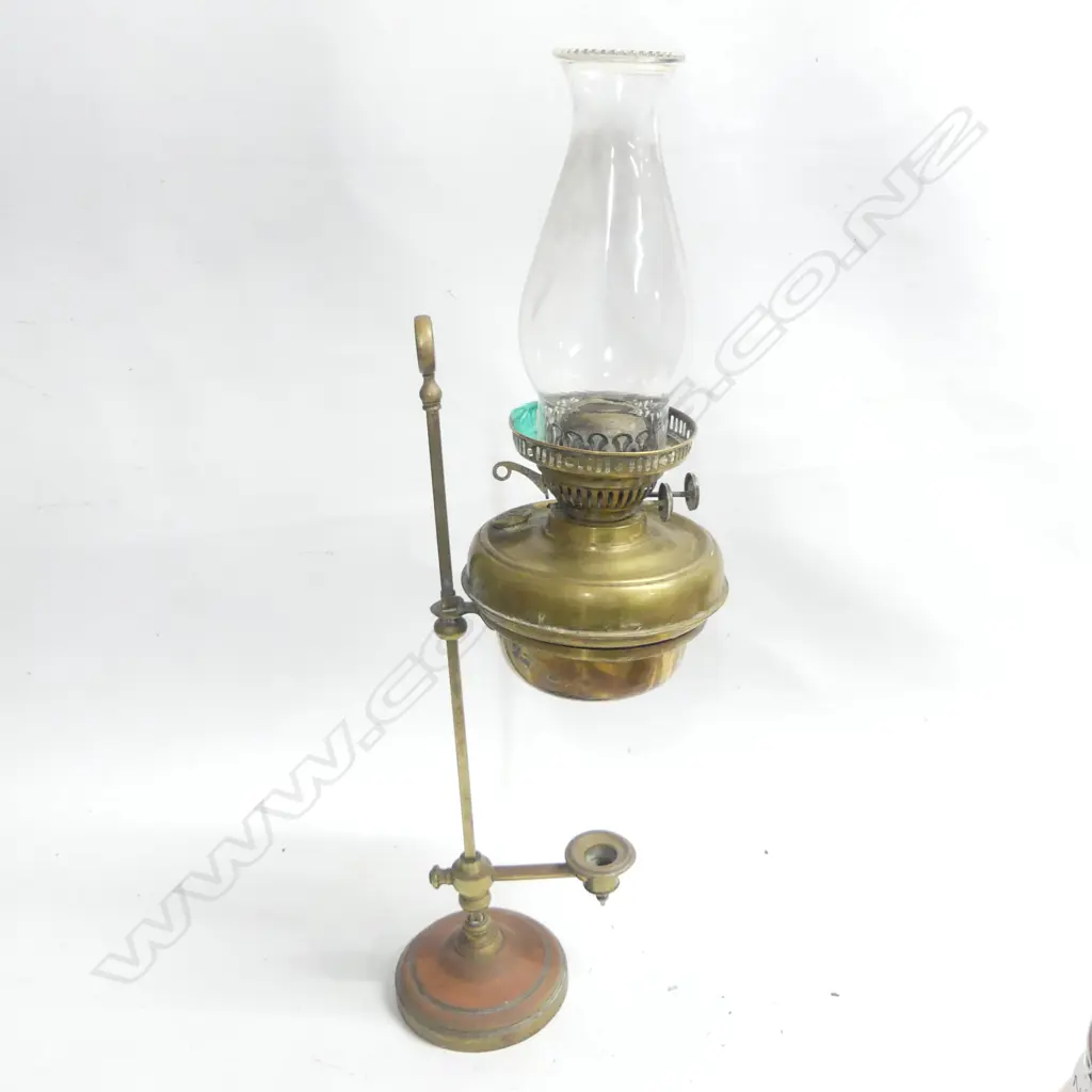 A copper spirit kettle on stand with milk glass handles, a copper bain marie pot with ceramic liner and a copper and brass lampstand (incomplete) Image 1++