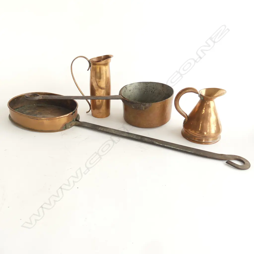 19thC copper 1½ gill measure,  a small tall copper jug, a small copper saucepan and a small oval roasting pan both with a riveted steel handles. Image 1++