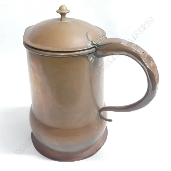A large Victorian copper lidded country jug of plain design with baluster base. H.320mm, handle distressed.
