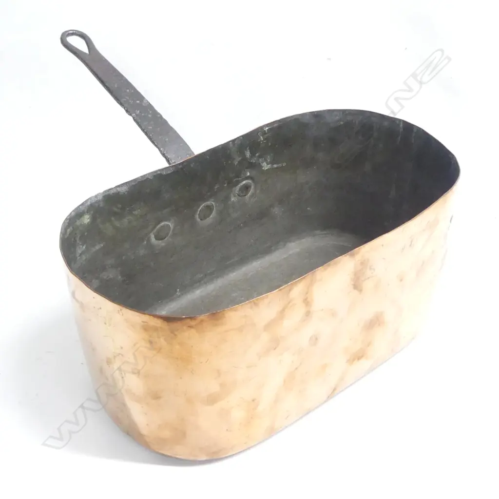 A George III copper oval fish pot, high sided, with wrought iron handle. W.340mm. Image 1++