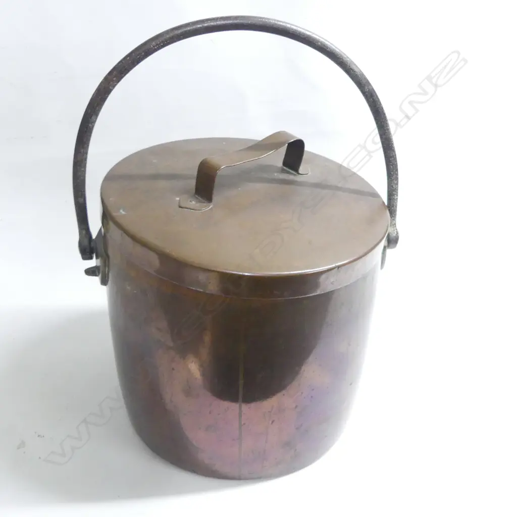 A very large 19thC copper kitchen pot, cylindrical with fitted lid and steel swing handle, of approximately 27 gallon capacity,  the lid with loop handle stamped '14'. Dia.355, H.350mm. Image 1++