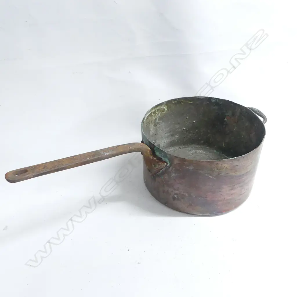 A large Victorian copper 30 pint cooking pot, cylinderical body with long riveted iron handle. Dia.330mm. Image 1++