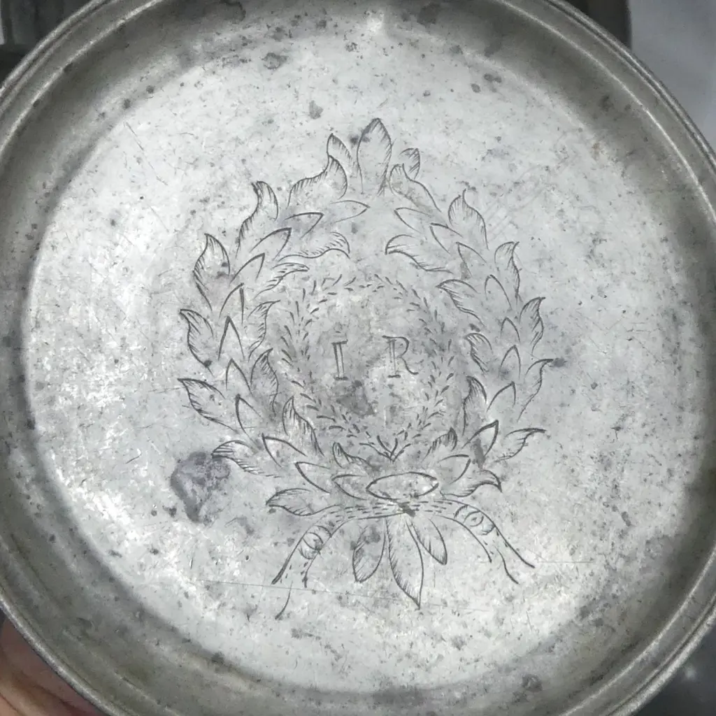 A collection of 19thC pewter tablewares comprising: graduated set of three pewter food covers AF; a pair of Georgian period pewter plates Dia.200mm; three Georgian plates, Dia.245mm; a pair of two-handled warming dishes, Dia.230mm; two small plates, Dia.100mm, and two sauce ladles. Image 1++