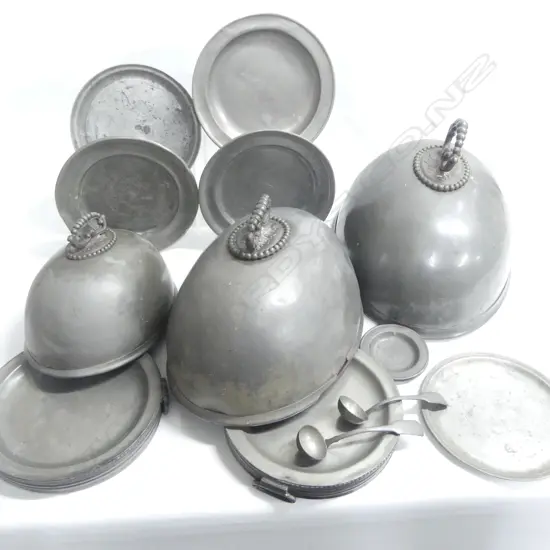A collection of 19thC pewter tablewares comprising: graduated set of three pewter food covers AF; a pair of Georgian period pewter plates Dia.200mm; three Georgian plates, Dia.245mm; a pair of two-handled warming dishes, Dia.230mm; two small plates, Dia.100mm, and two sauce ladles.