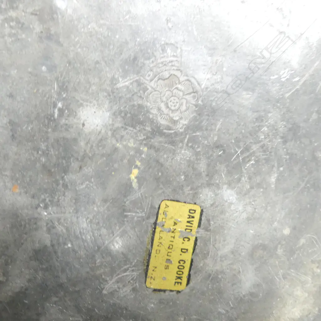 A large Georgian period pewter charger. Dia.420mm; three Georgian chargers.  Dia.380mm; a large Georgian plate. Dia.300mm- and two European pewter serving spoons with turned wooden handles, Image 1++