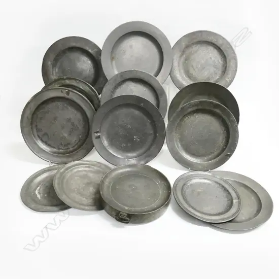 Thirteen Georgian period pewter plates of plain design with wide flat rims- approx Dia.230mm; together with a water-jacketed warming plate with London touch marks