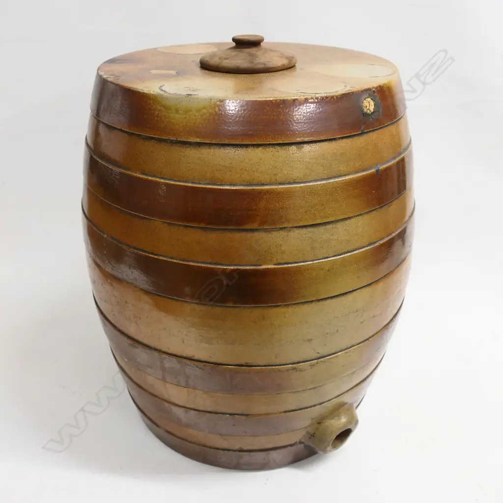 A large tan stoneware barrel with moulded rings. H.420mm Image 1++