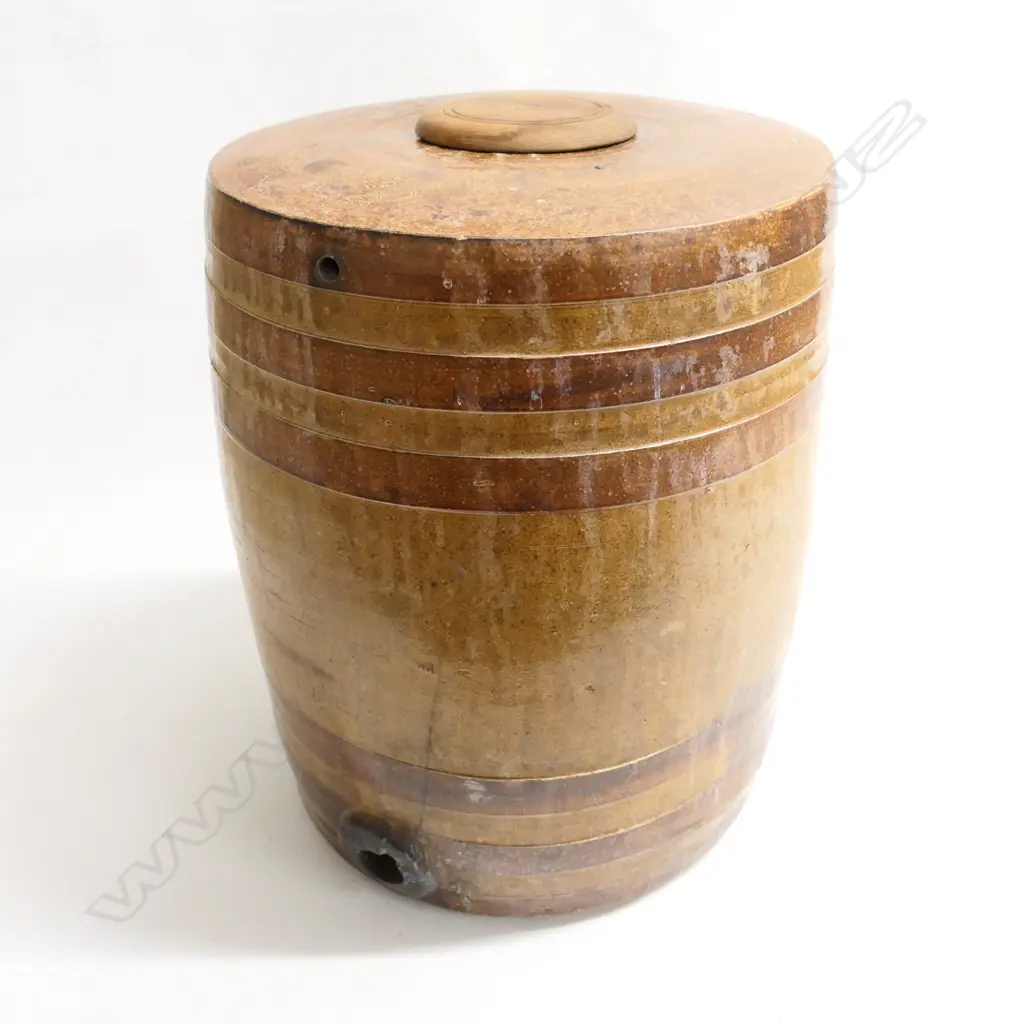 A large tan stoneware barrel with moulded rings. H.380mm Image 1++