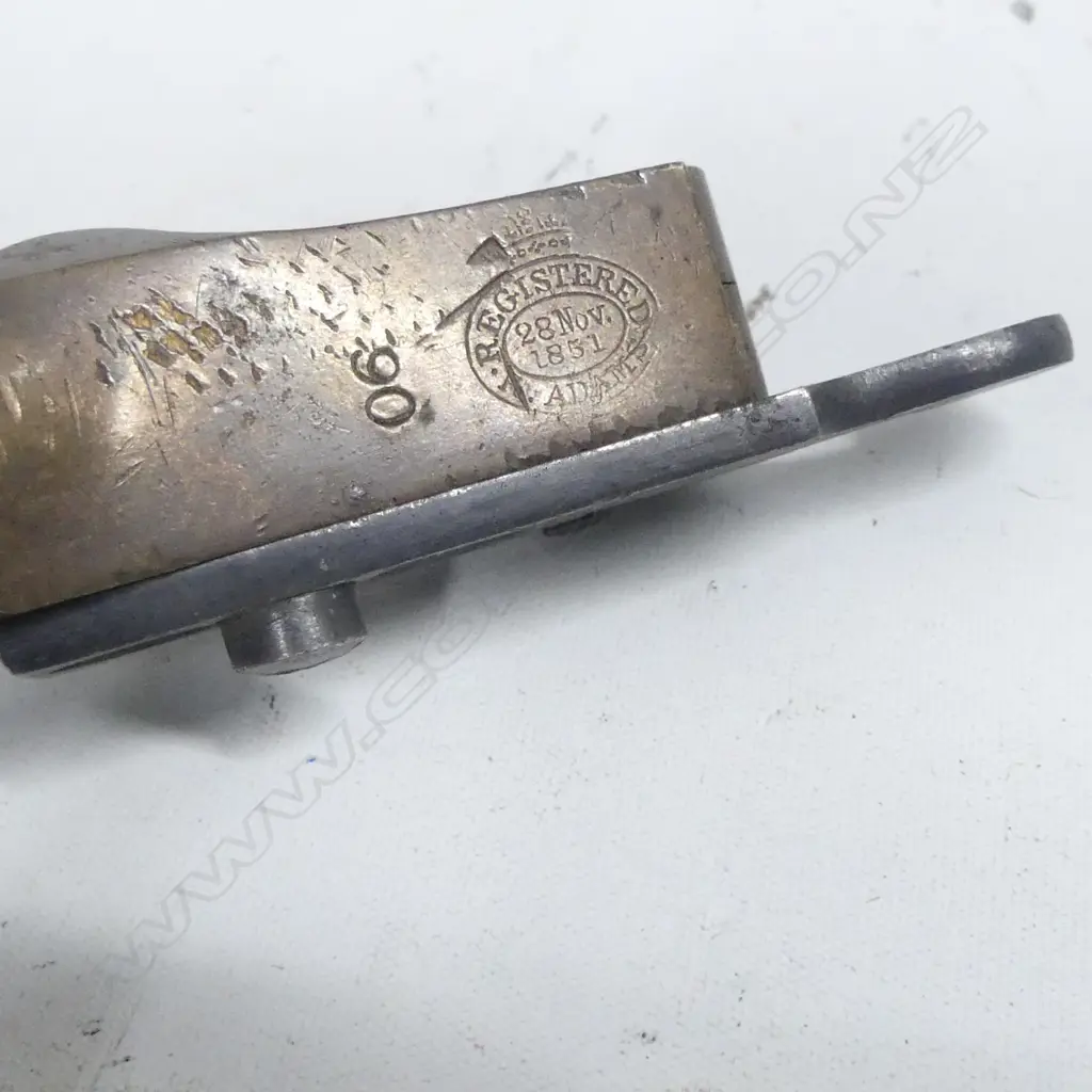 An Adam's Patent 90 bore bronze mould, for round ball and conical bullet marked ‘90’ and ‘Registered Adams. 28 Nov 1851’. Good condition. Image 1++