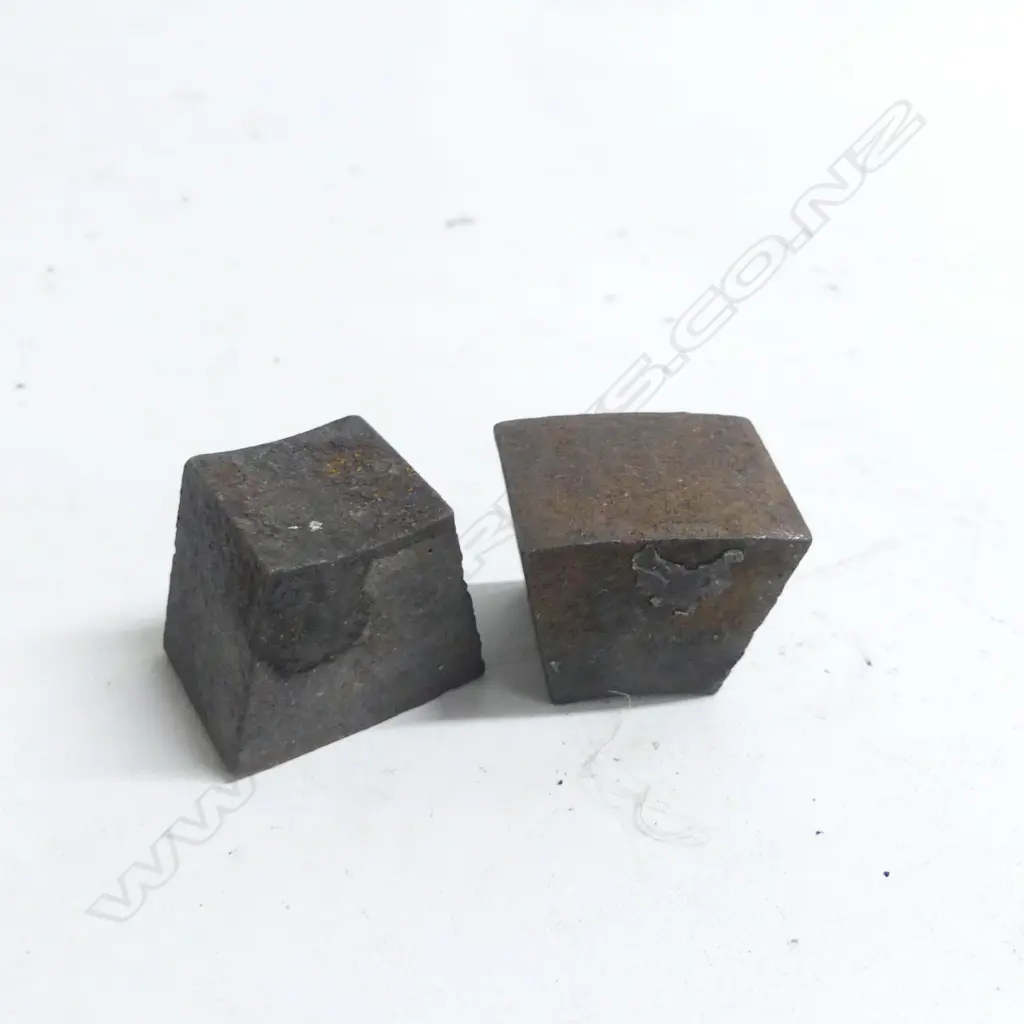 Two pieces of trapezoid steel, reputedly shrapnel from Armstrong 25-pdr gun, Image 1++