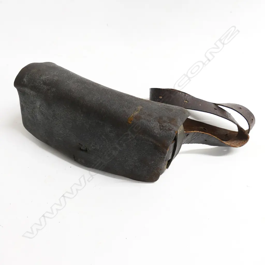 A leather bound ammunition pouch. Possibly used in the New Zealand Wars,  'Henare' etched into belt. Image 1++