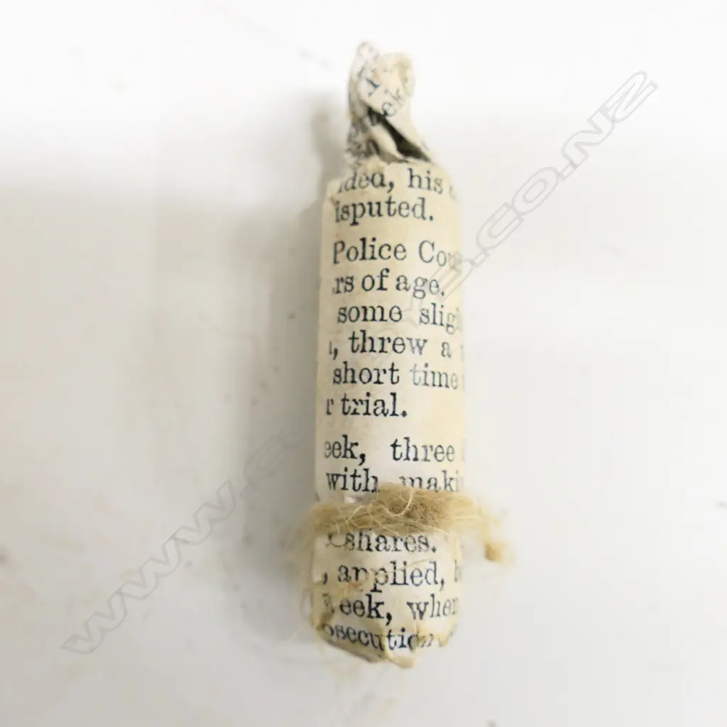 A leather bound ammunition pouch. Possibly used in the New Zealand Wars,  'Henare' etched into belt. Image 1++