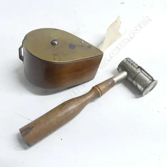 A cloth ribbon dispenser reputedly for patching lead bullets and a powder/shot dipper by BGI Co.,