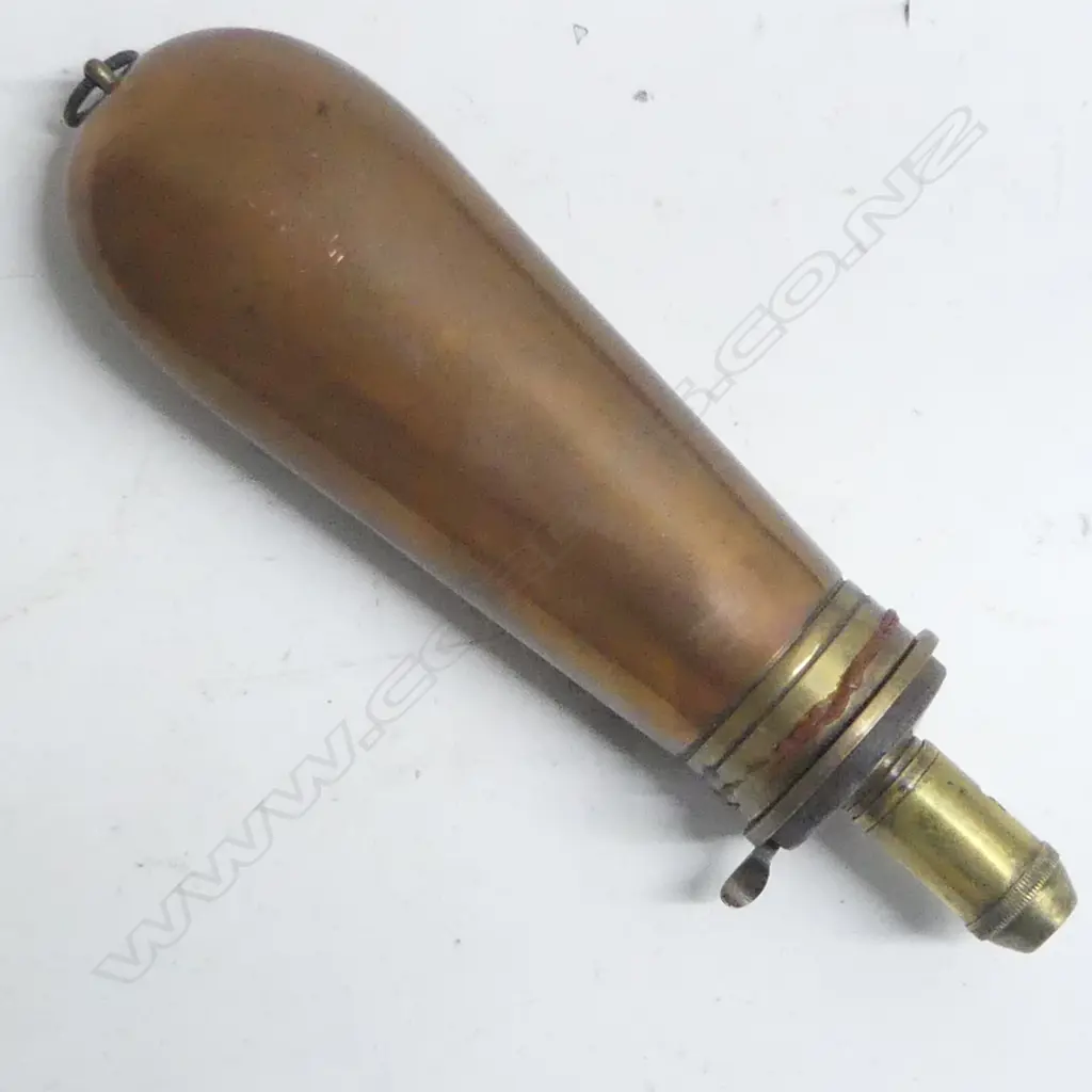 A  copper and brass gunpowder flask with graduated dispenser nozzle Image 1++