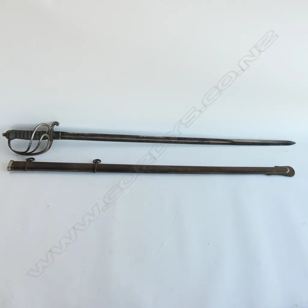 An 1821 pattern Royal Artillery Officer's sword with steel scabbard, the nickel plated 'three bar' hilt with open swept guard and sharkskin wire bound grip. Image 1++