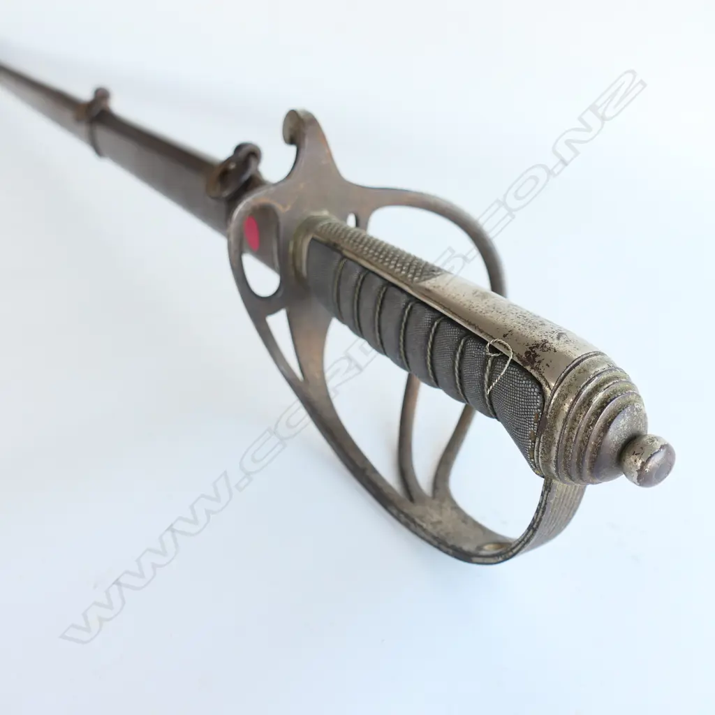 An 1821 pattern Royal Artillery Officer's sword with steel scabbard, the nickel plated 'three bar' hilt with open swept guard and sharkskin wire bound grip. Image 1++