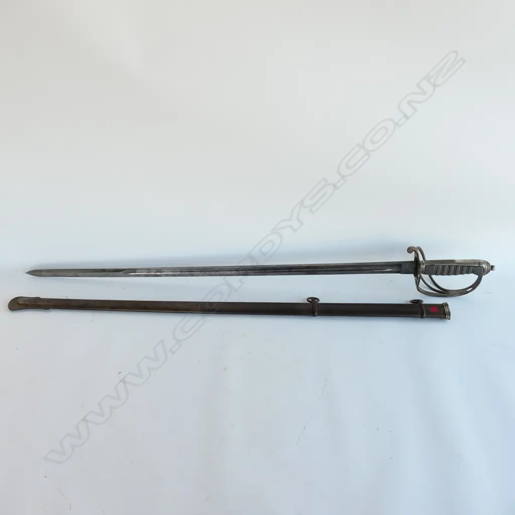 An 1821 pattern Royal Artillery Officer's sword with steel scabbard, the nickel plated 'three bar' hilt with open swept guard and sharkskin wire bound grip. Image 1++