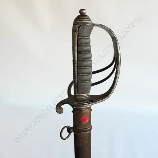 An 1821 pattern Royal Artillery Officer's sword with steel scabbard, the nickel plated 'three bar' hilt with open swept guard and sharkskin wire bound grip.