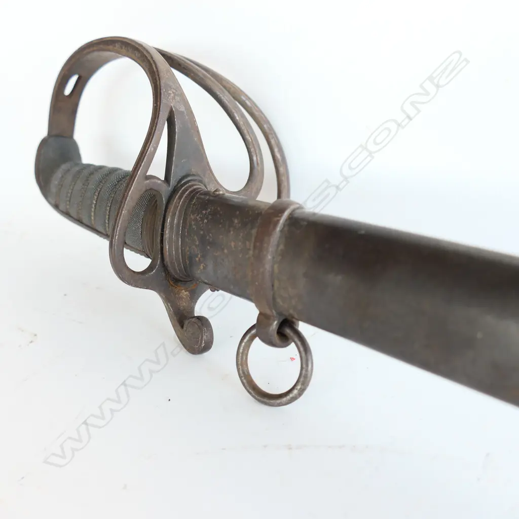 An 1821 Pattern Royal Artillery Officer's sword with steel scabbard, the 'three bar' hilt with open swept guard and sharkskin wire bound grip. Image 1++