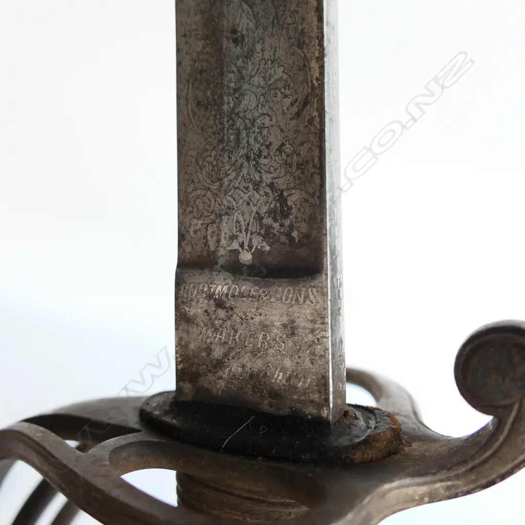 An 1821 Pattern Royal Artillery Officer's sword with steel scabbard, the 'three bar' hilt with open swept guard and sharkskin wire bound grip. Image 1++