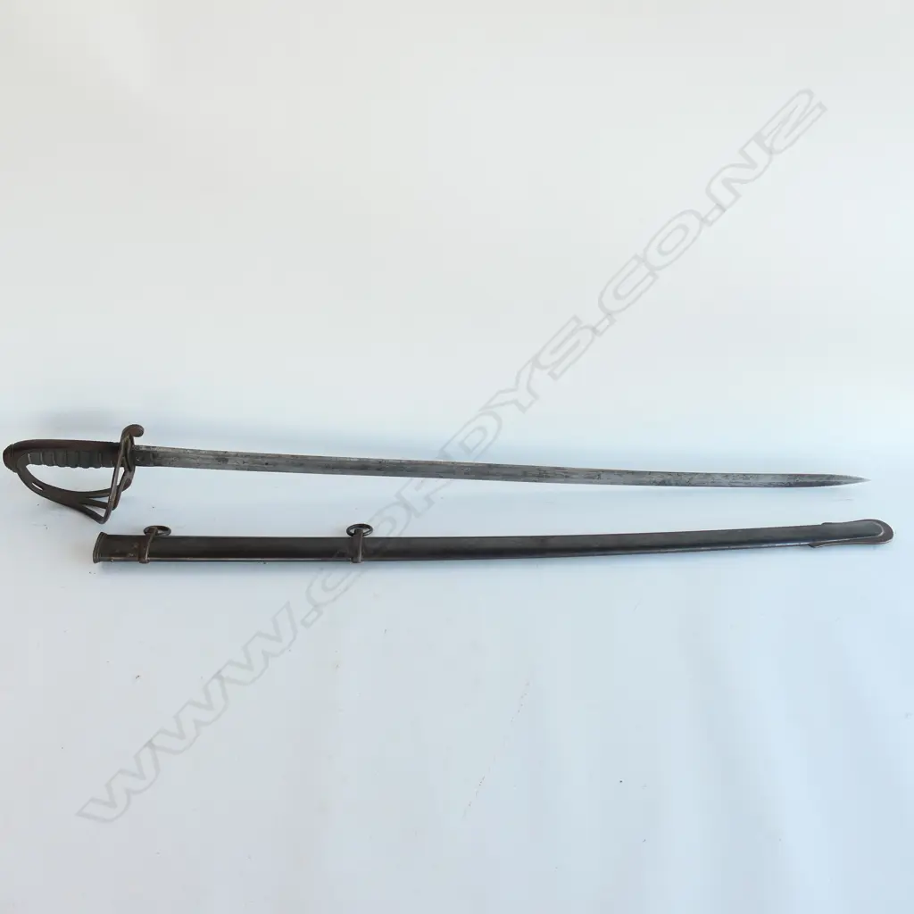 An 1821 Pattern Royal Artillery Officer's sword with steel scabbard, the 'three bar' hilt with open swept guard and sharkskin wire bound grip. Image 1++