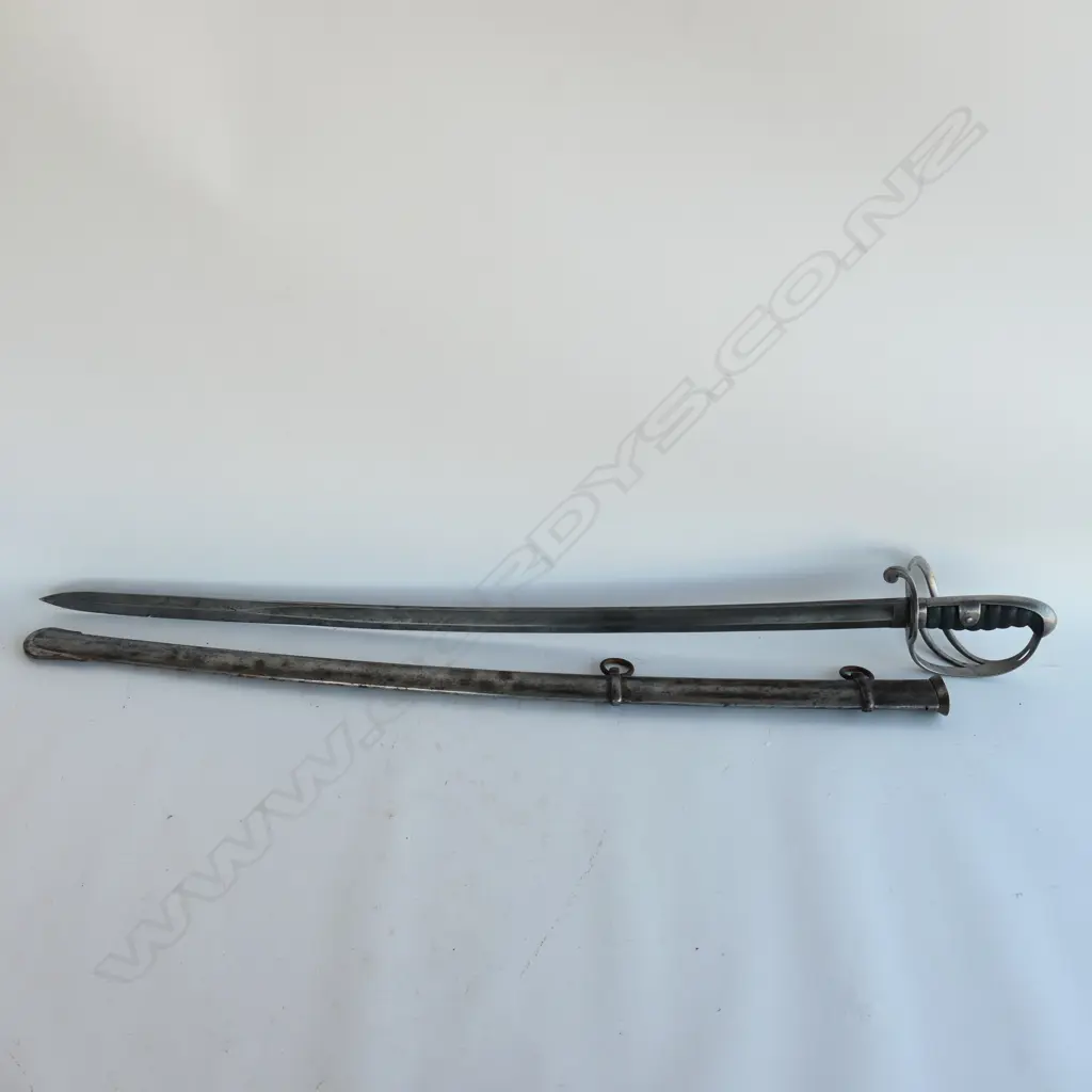A Light Cavalry Trooper's sabre and steel scabbard,1821 pattern, with 890mm slightly curved single fullered, spear pointed blade, Image 1++