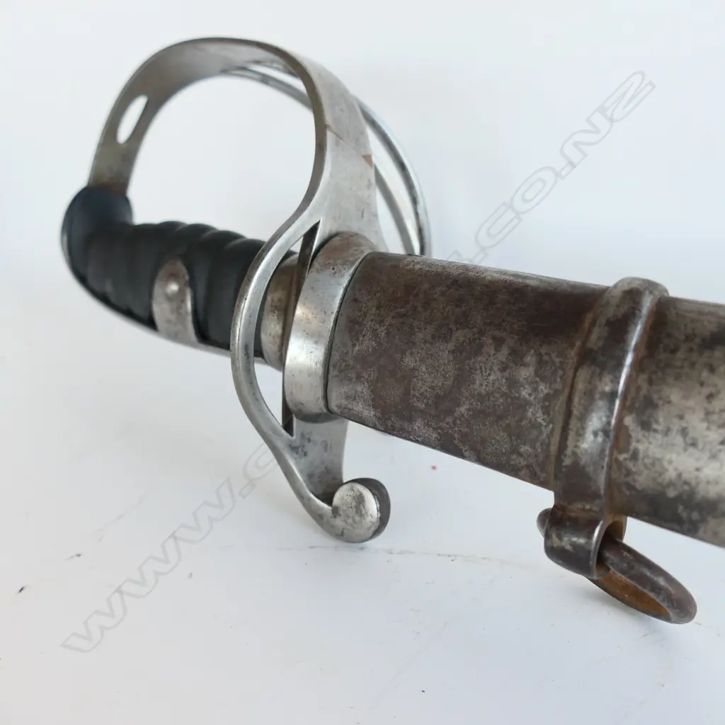 A Light Cavalry Trooper's sabre and steel scabbard,1821 pattern, with 890mm slightly curved single fullered, spear pointed blade, Image 1++
