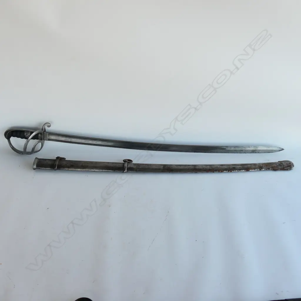 A Light Cavalry Trooper's sabre and steel scabbard,1821 pattern, with 890mm slightly curved single fullered, spear pointed blade, Image 1++