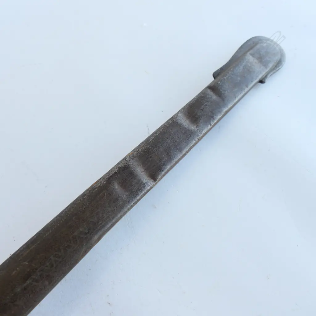An 1853 Pattern Cavalry Trooper's sword and scabbard, the 895mm single edge fullered steel blade stamped to back edge ‘Mole’ for Robert Mole, Birmingham, Image 1++