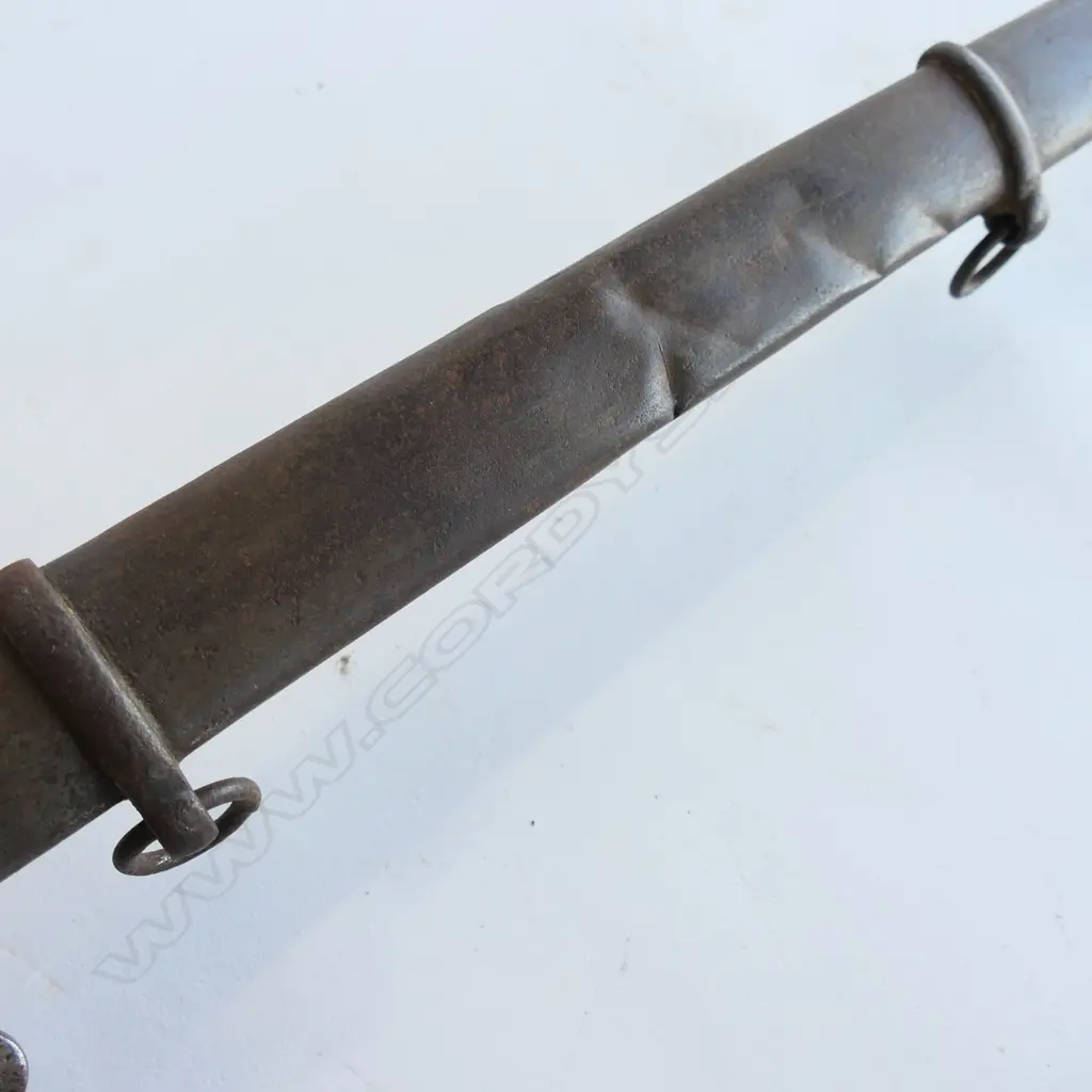 An 1853 Pattern Cavalry Trooper's sword and scabbard, the 895mm single edge fullered steel blade stamped to back edge ‘Mole’ for Robert Mole, Birmingham, Image 1++