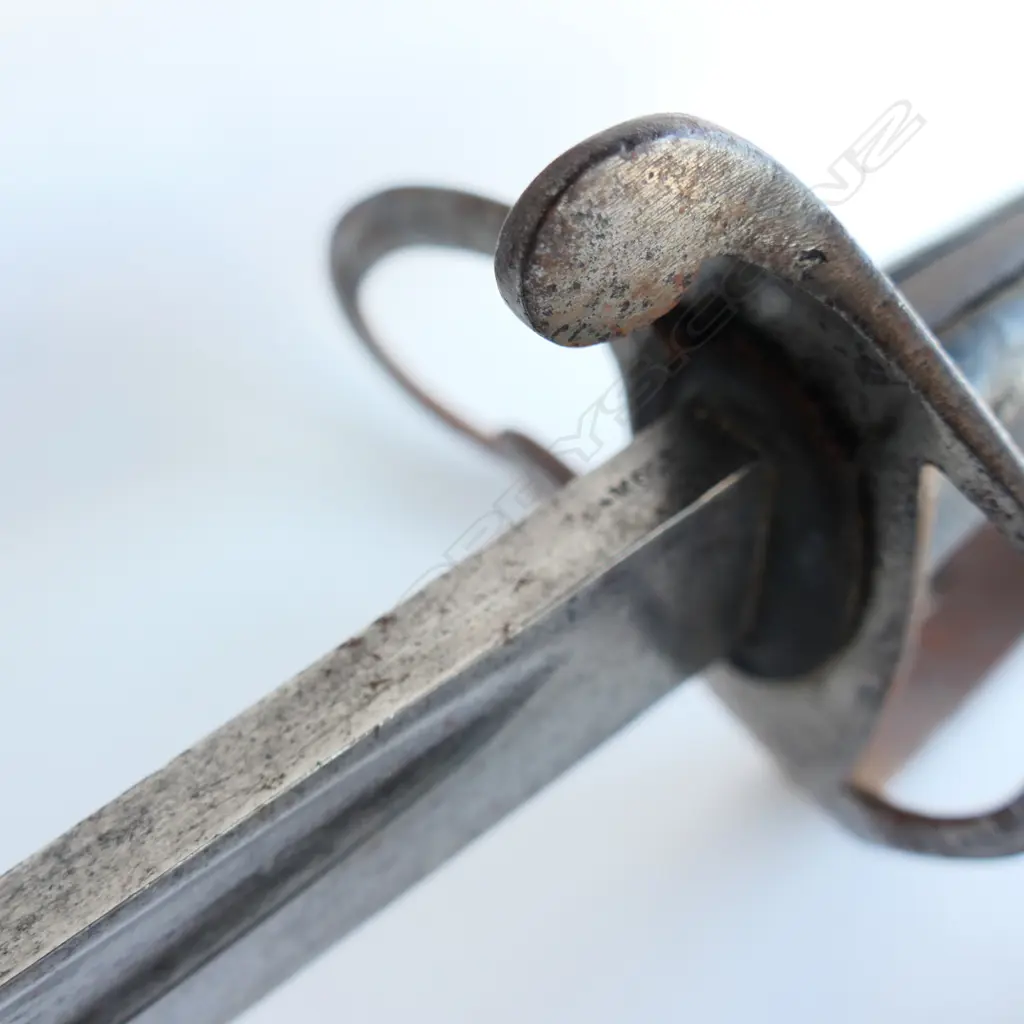 An 1853 Pattern Cavalry Trooper's sword and scabbard, the 895mm single edge fullered steel blade stamped to back edge ‘Mole’ for Robert Mole, Birmingham, Image 1++