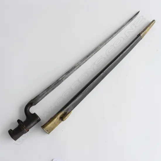 British 1853 Enfield Triangular Socket Bayonet (‘1722’) and matching scabbard (‘WD broad arrow’ and ‘1722’), brass mounted black leather scabbard in good condition.