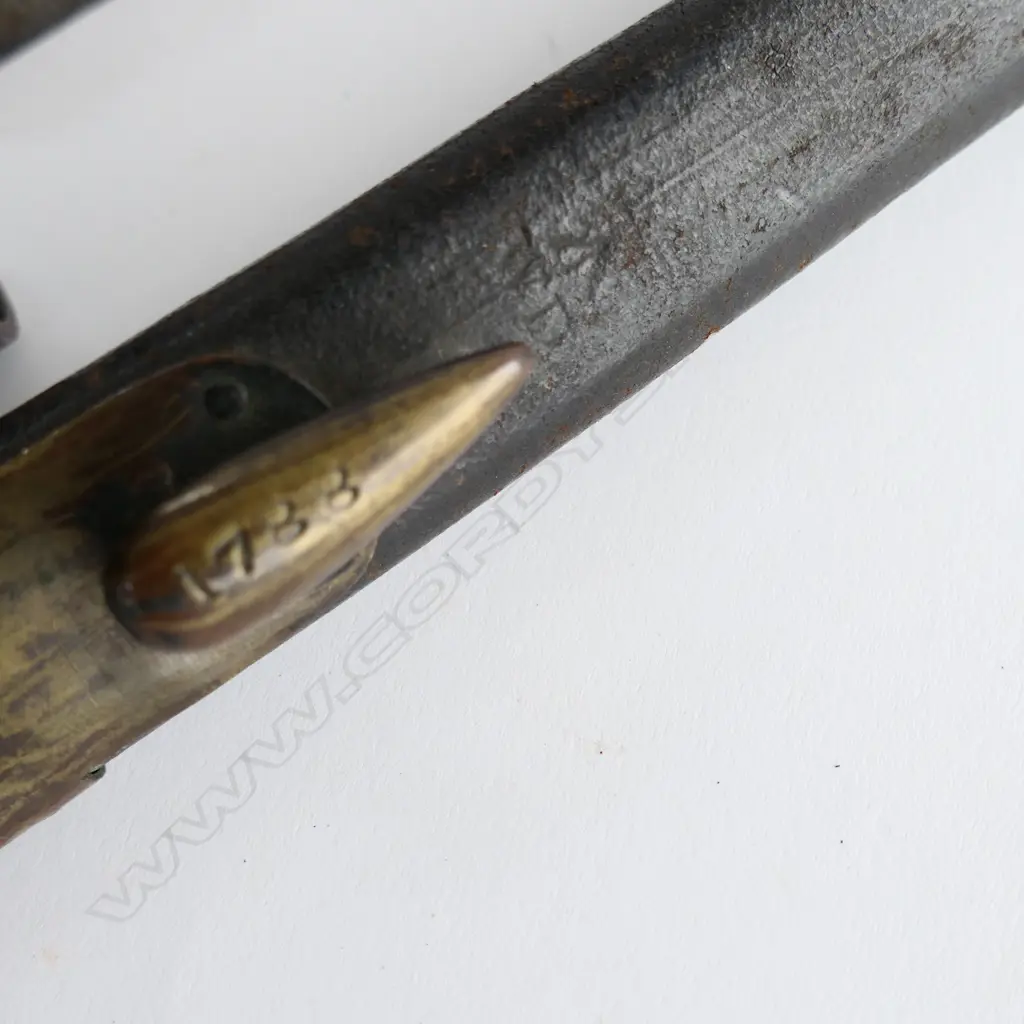 British 1853 Enfield Triangular Socket Bayonet (‘74’) and Scabbard (‘WD broad arrow 1788’), brass mounted black leather scabbard with chape glued. Image 1++