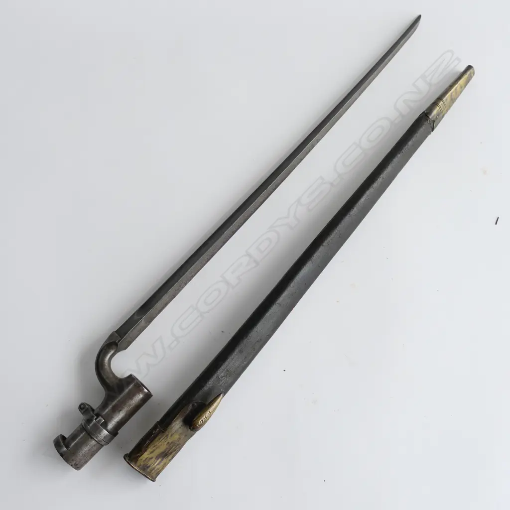 British 1853 Enfield Triangular Socket Bayonet (‘74’) and Scabbard (‘WD broad arrow 1788’), brass mounted black leather scabbard with chape glued. Image 1++