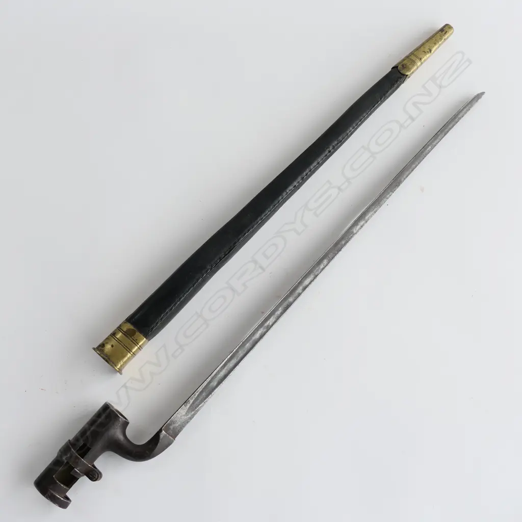 British 1853 Enfield Triangular Socket Bayonet (‘WD broad arrow’, Enfield proof) and Scabbard (‘WD broad arrow’), brass mounted black leather scabbard. Image 1++