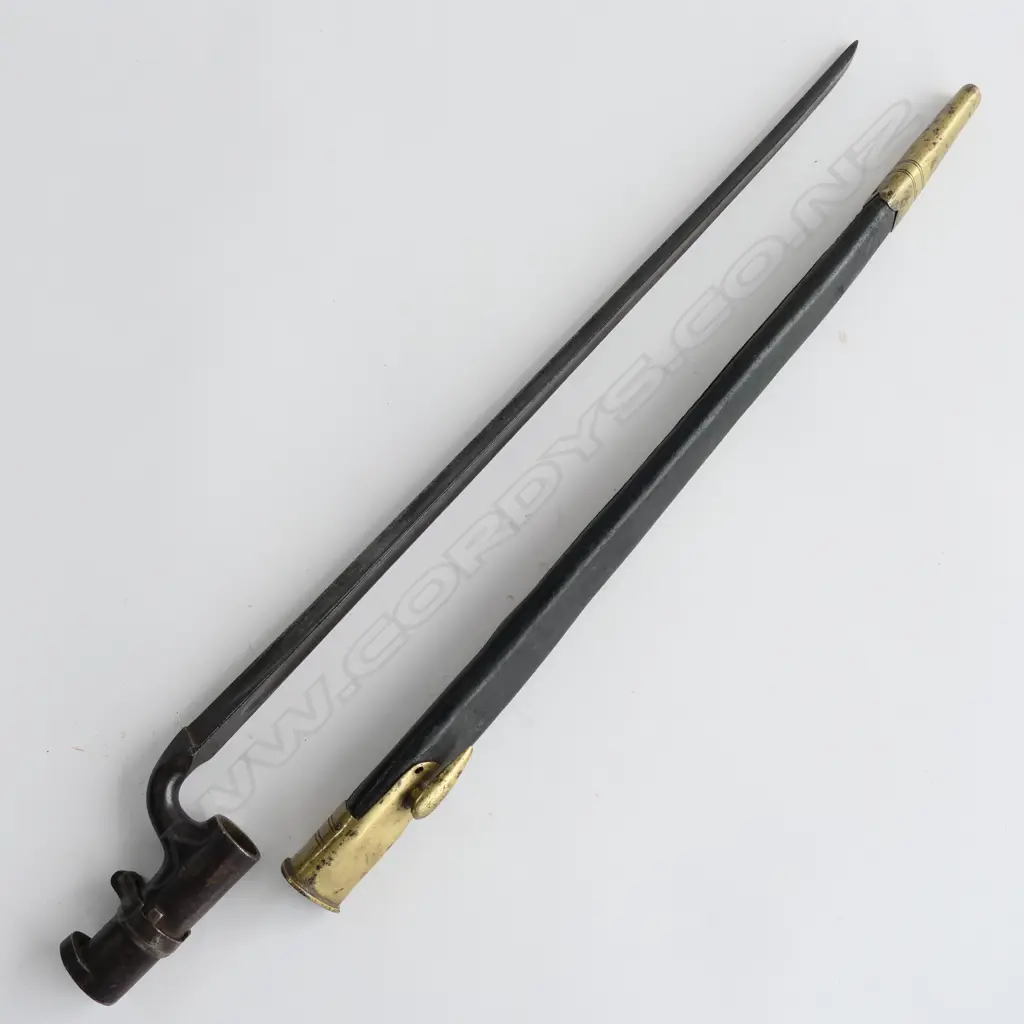 British 1853 Enfield Triangular Socket Bayonet (‘WD broad arrow’, Enfield proof) and Scabbard (‘WD broad arrow’), brass mounted black leather scabbard. Image 1++