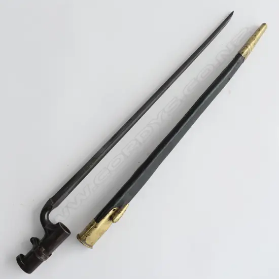 British 1853 Enfield Triangular Socket Bayonet (‘WD broad arrow’, Enfield proof) and Scabbard (‘WD broad arrow’), brass mounted black leather scabbard.